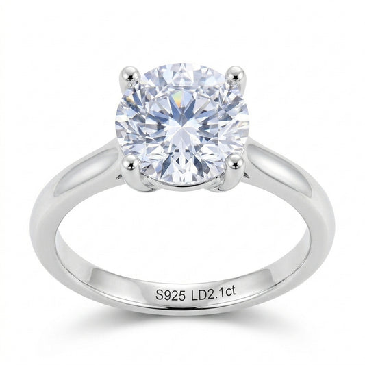 Front view of 2.1ct round cut lab grown diamond four prong solitaire engagement ring.