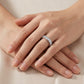Close up view of hands showing 2.78 ctw pear cut lab grown diamond eternity ring