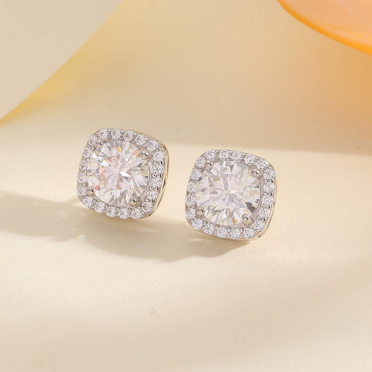  Yellow gold square moissanite studs on neutral background. Alt: “2.4 CT Square Moissanite Stud Earrings – 18K Yellow Gold.”