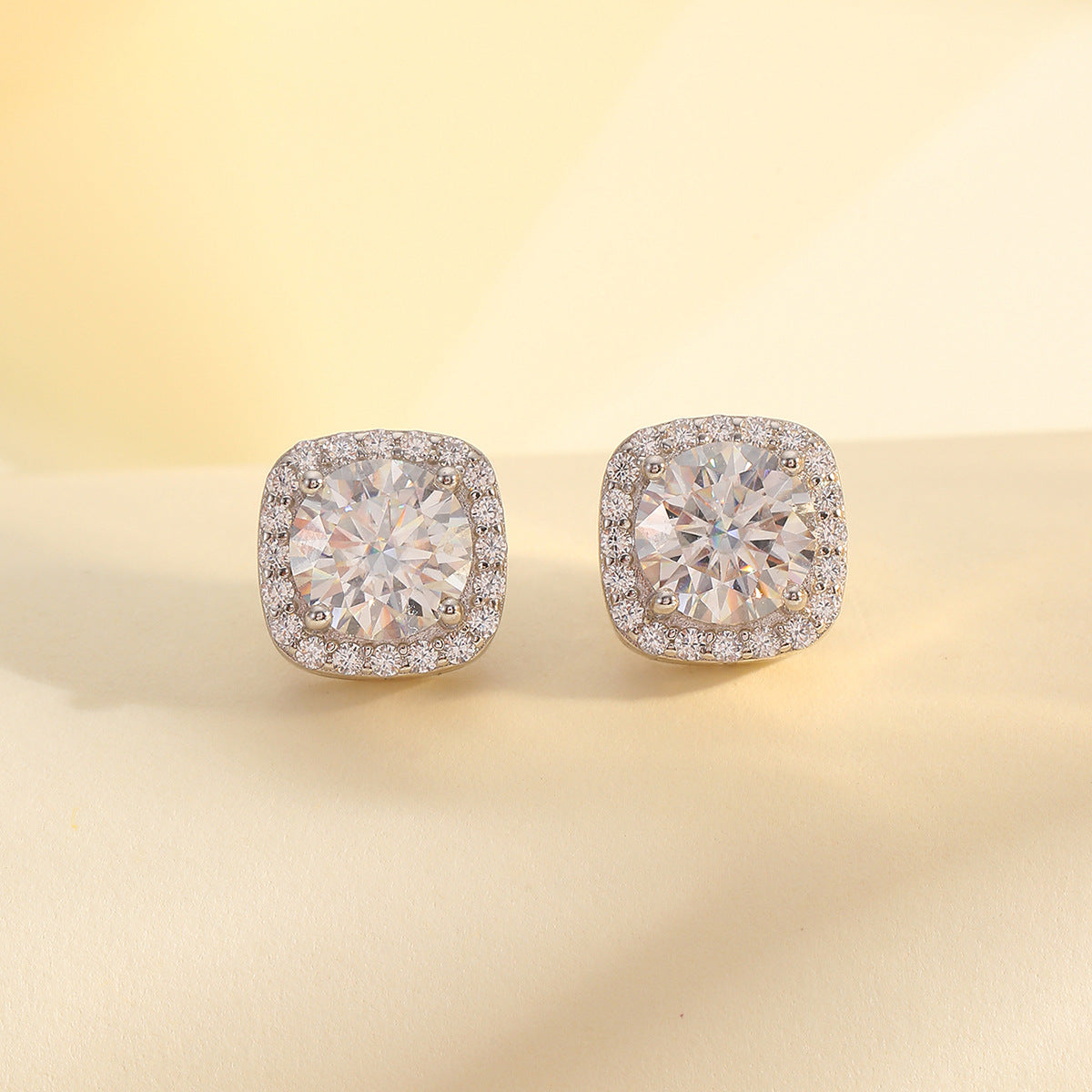  Yellow gold square moissanite studs on neutral background. Alt: “2.4 CT Square Moissanite Stud Earrings – 18K Yellow Gold.”
