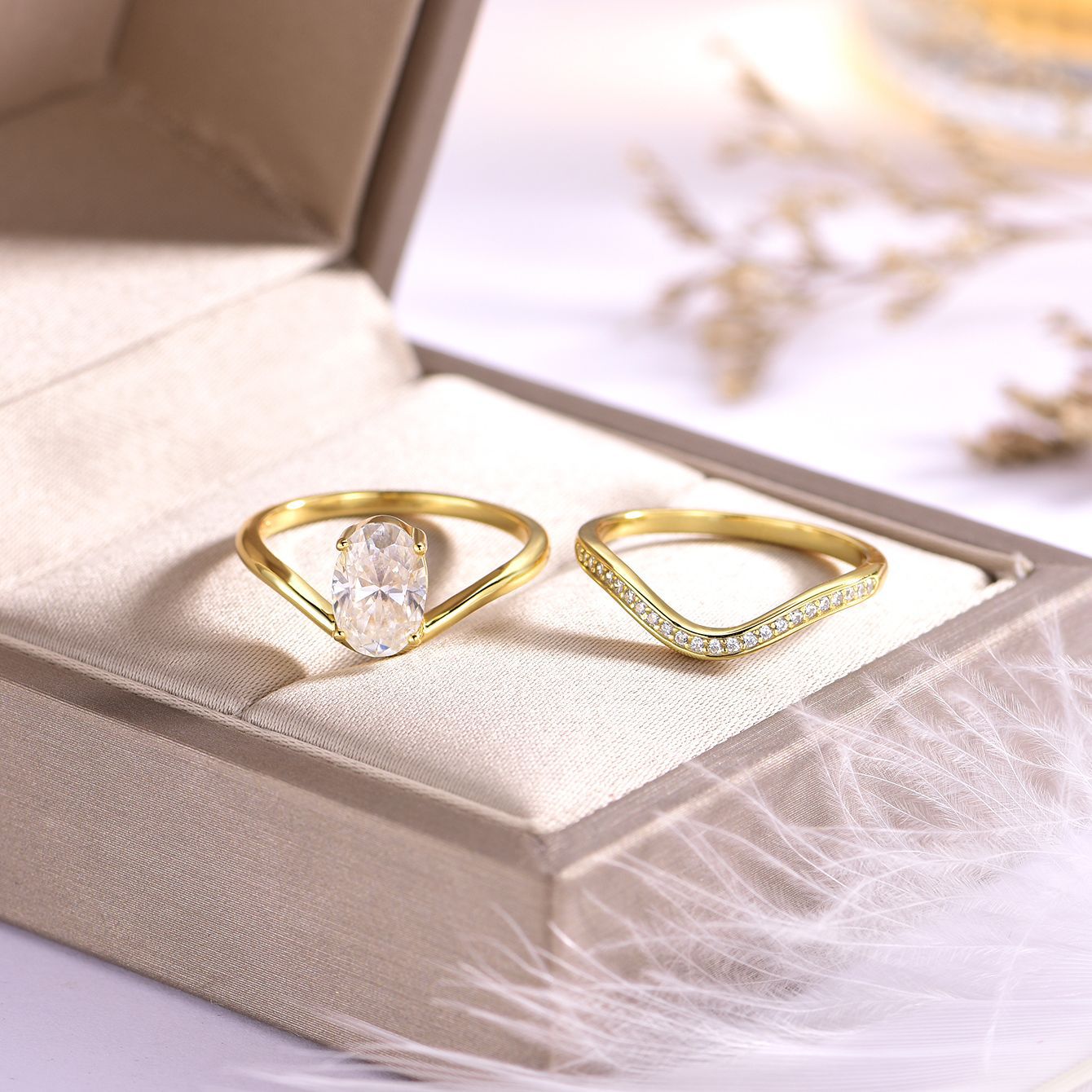 Yellow gold 2.5ct oval stacking set on neutral background. Alt: “2.50ct Egg Shape Diamond Stacking Set – 18K Yellow Gold.”
