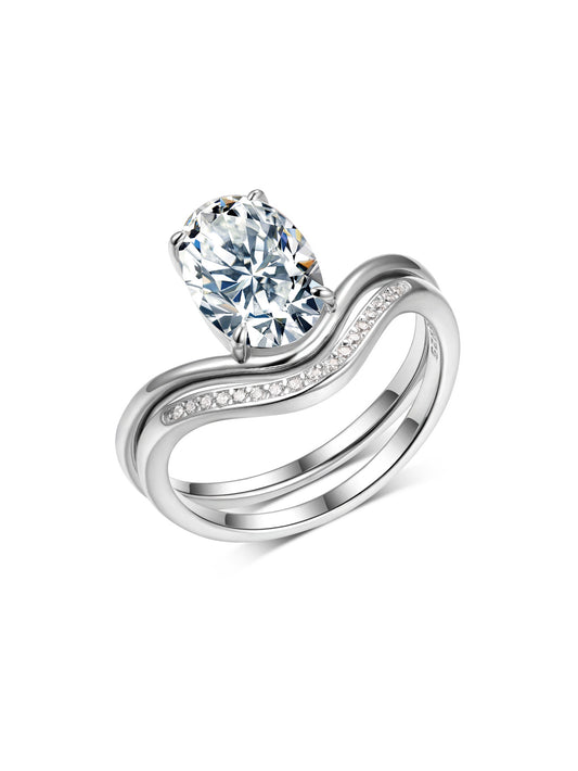 Yellow gold 2.5ct oval stacking set on neutral background. Alt: “2.50ct Egg Shape Diamond Stacking Set – 18K Yellow Gold.”