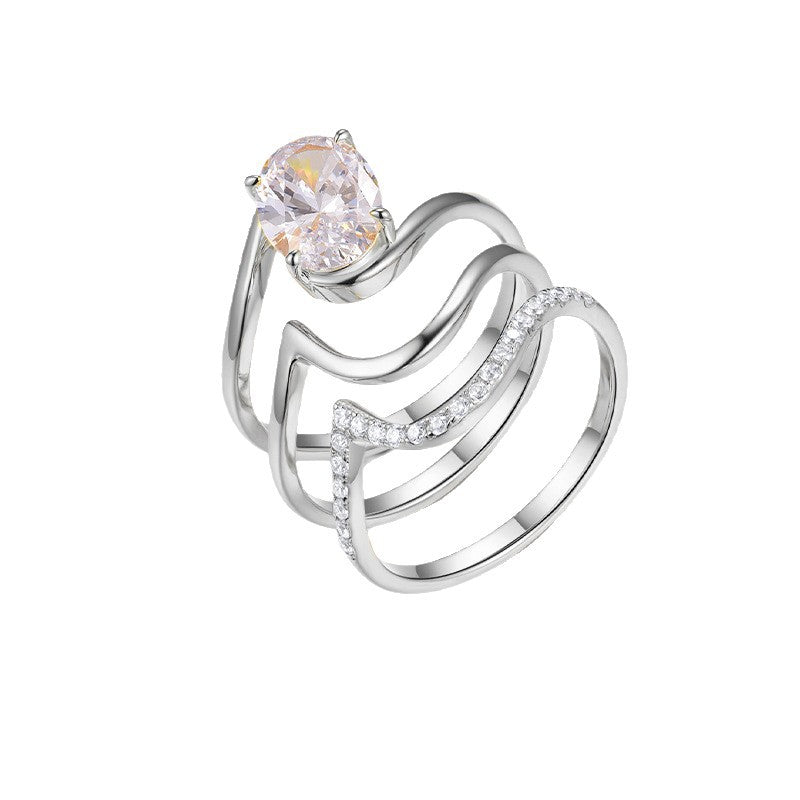  Yellow gold oval stacking set on neutral background. Alt: “2.5CT Oval Diamond Stacking Ring Set – 18K Yellow Gold.”