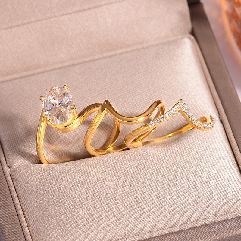  Yellow gold oval stacking set on neutral background. Alt: “2.5CT Oval Diamond Stacking Ring Set – 18K Yellow Gold.”
