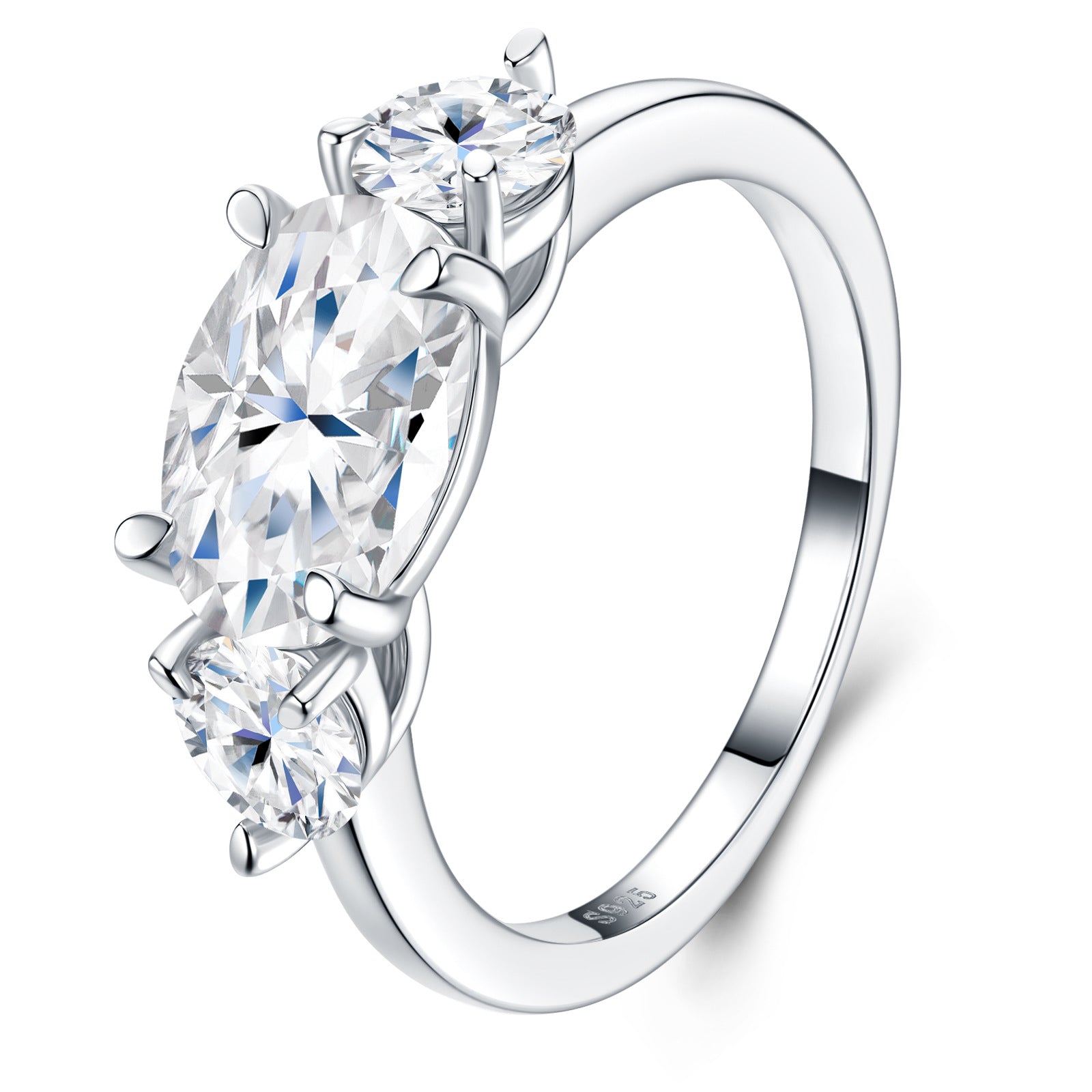 Angled view showing 2.5ct oval moissanite center stone flanked by pear-cut side accents.
