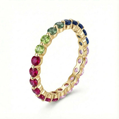 Gold 2.5mm round rainbow gradient gemstone eternity band ring isolated on white background