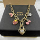 COACH Strawberry & Heart Multi-Charm Gold-Tone Chain Necklace