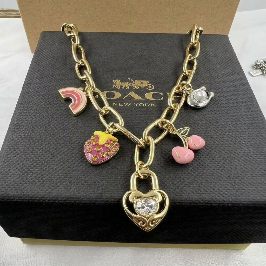 COACH Strawberry & Heart Multi-Charm Gold-Tone Chain Necklace
