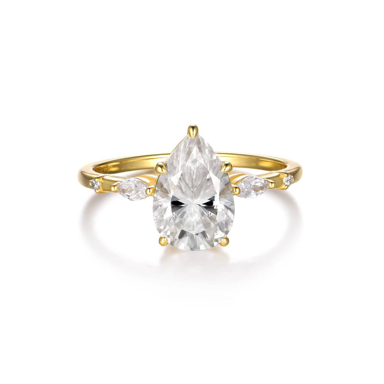  Yellow gold petal teardrop ring on soft romantic background. Alt: “2CT Petal-Shaped Teardrop Moissanite Ring – 18K Yellow Gold.”
