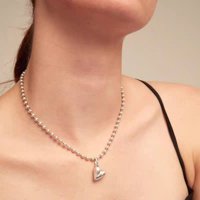 UNOde50 Bead necklace with heart detail