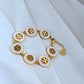 Tory Burch Gold and White Medallion Bracelet