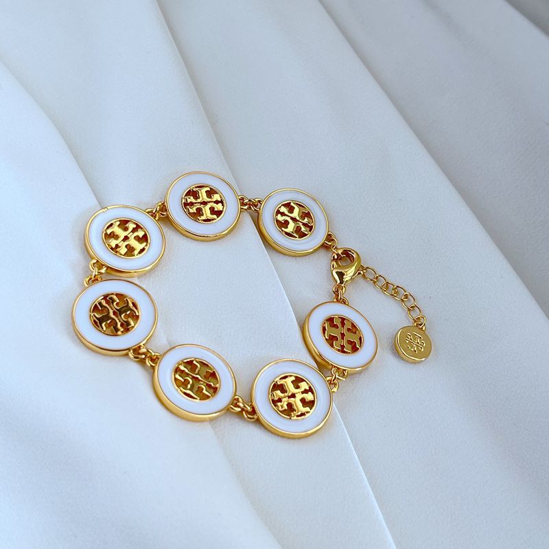 Tory Burch Gold and White Medallion Bracelet