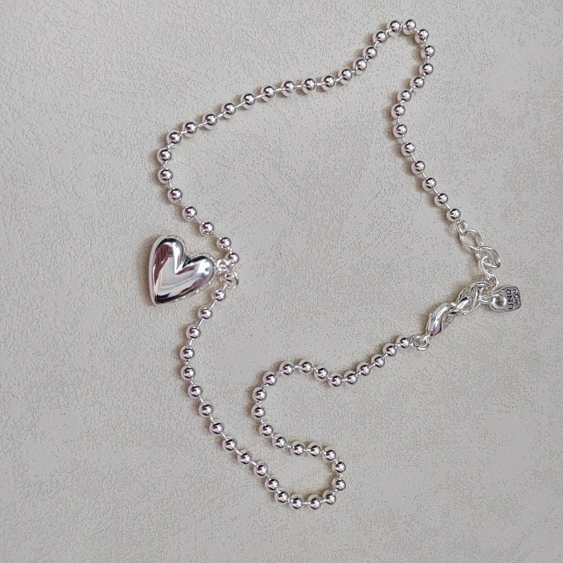 UNOde50 Bead necklace with heart detail