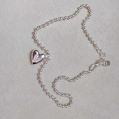 UNOde50 Bead necklace with heart detail