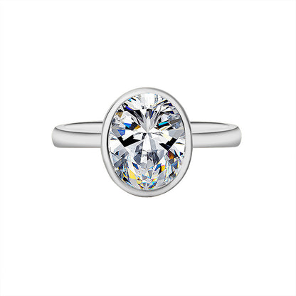 Silver ring with a large diamond on a white background