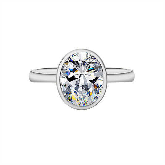 Silver ring with a large diamond on a white background