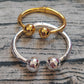 UNOde50 Bangle bracelet with double ball