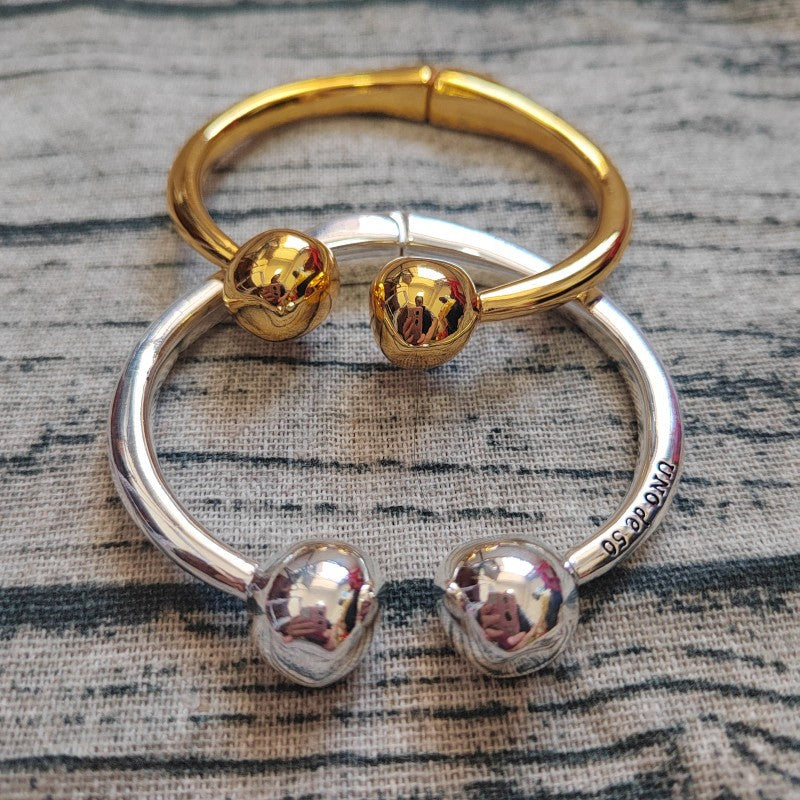 UNOde50 Bangle bracelet with double ball