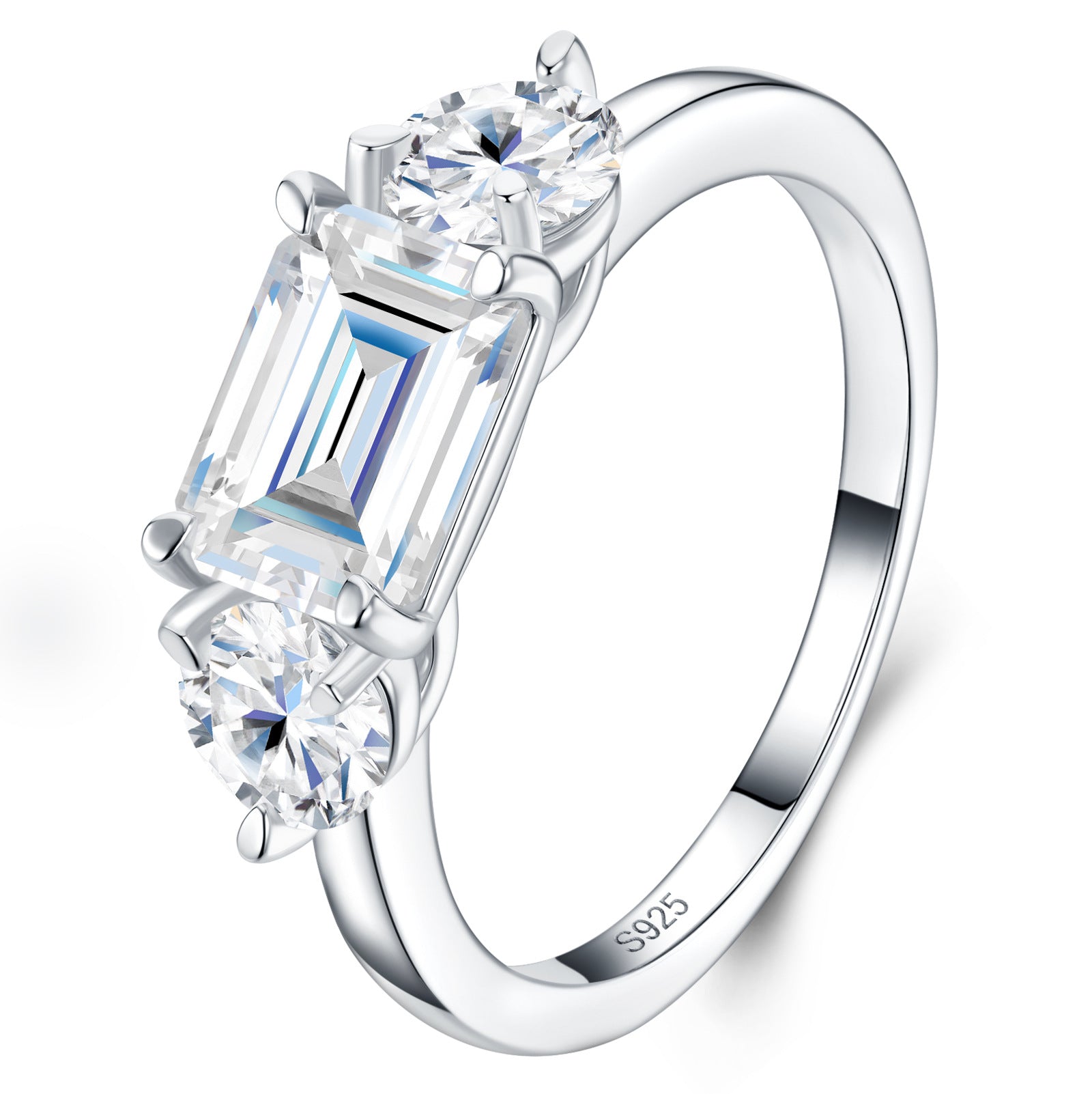 Silver 2ct emerald cut moissanite ring with round side stones displayed at an angle.