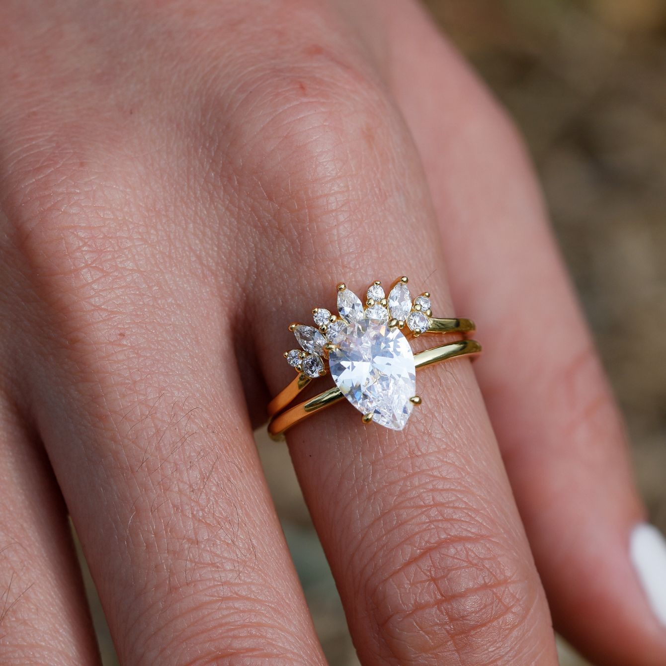  Set worn as double-stacked wedding rings. Alt: “Romantic Silhouette: Pear Cut Diamond Bridal Set.”