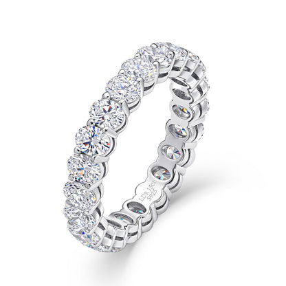 3.15 ctw oval cut lab grown diamond eternity ring in sterling silver isolated on white background