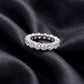 3.84 ctw round brilliant lab grown diamond eternity wedding band resting flat on dark black silk