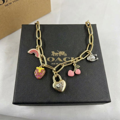 COACH Strawberry & Heart Multi-Charm Gold-Tone Chain Necklace