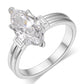 Yellow gold 3CT marquise moissanite ring on soft romantic background. Alt: “3CT Marquise Moissanite Engagement Ring – 18K Yellow Gold.”