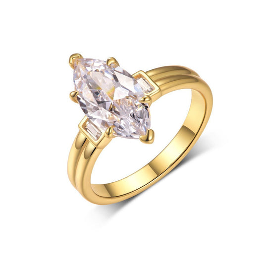 Yellow gold 3CT marquise moissanite ring on soft romantic background. Alt: “3CT Marquise Moissanite Engagement Ring – 18K Yellow Gold.”