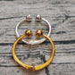 UNOde50 Bangle bracelet with double ball