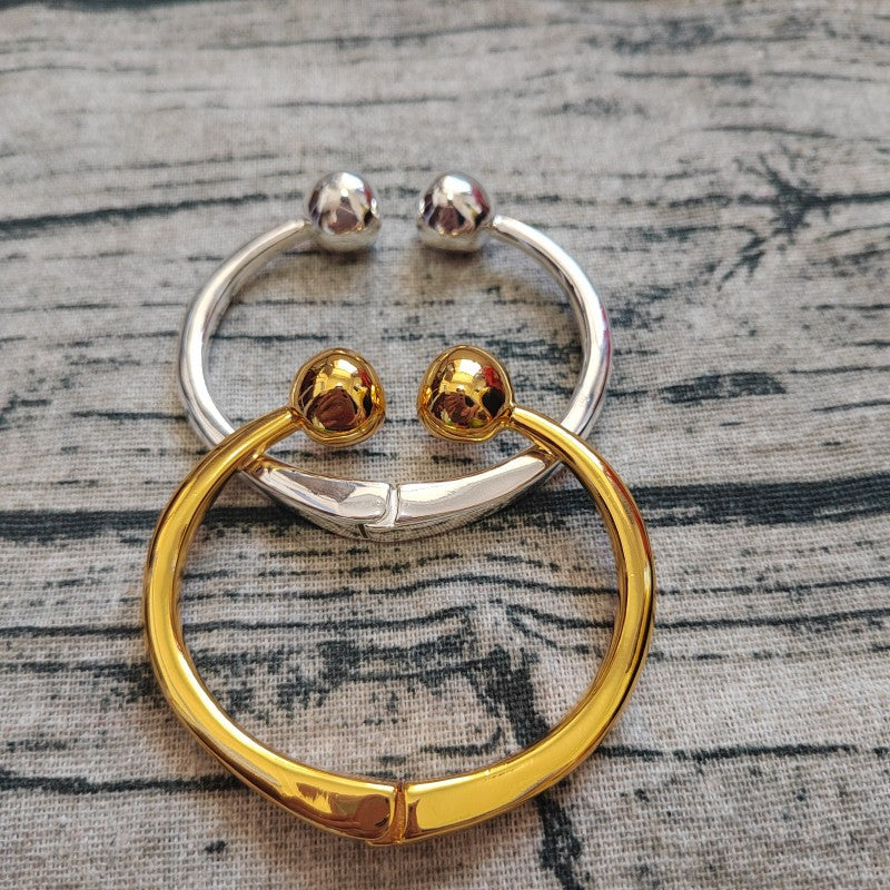 UNOde50 Bangle bracelet with double ball