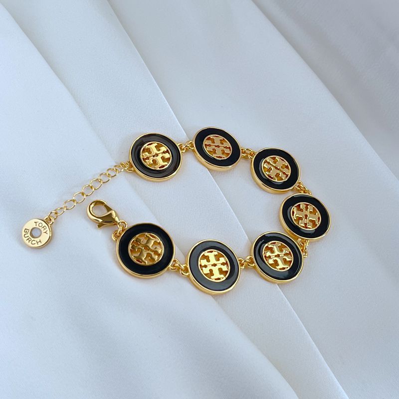 Tory Burch Gold and White Medallion Bracelet