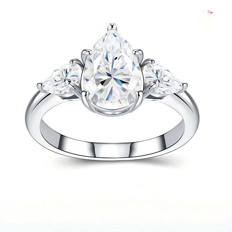 3CT pear cut moissanite three-stone engagement ring with pear side accents on white background.