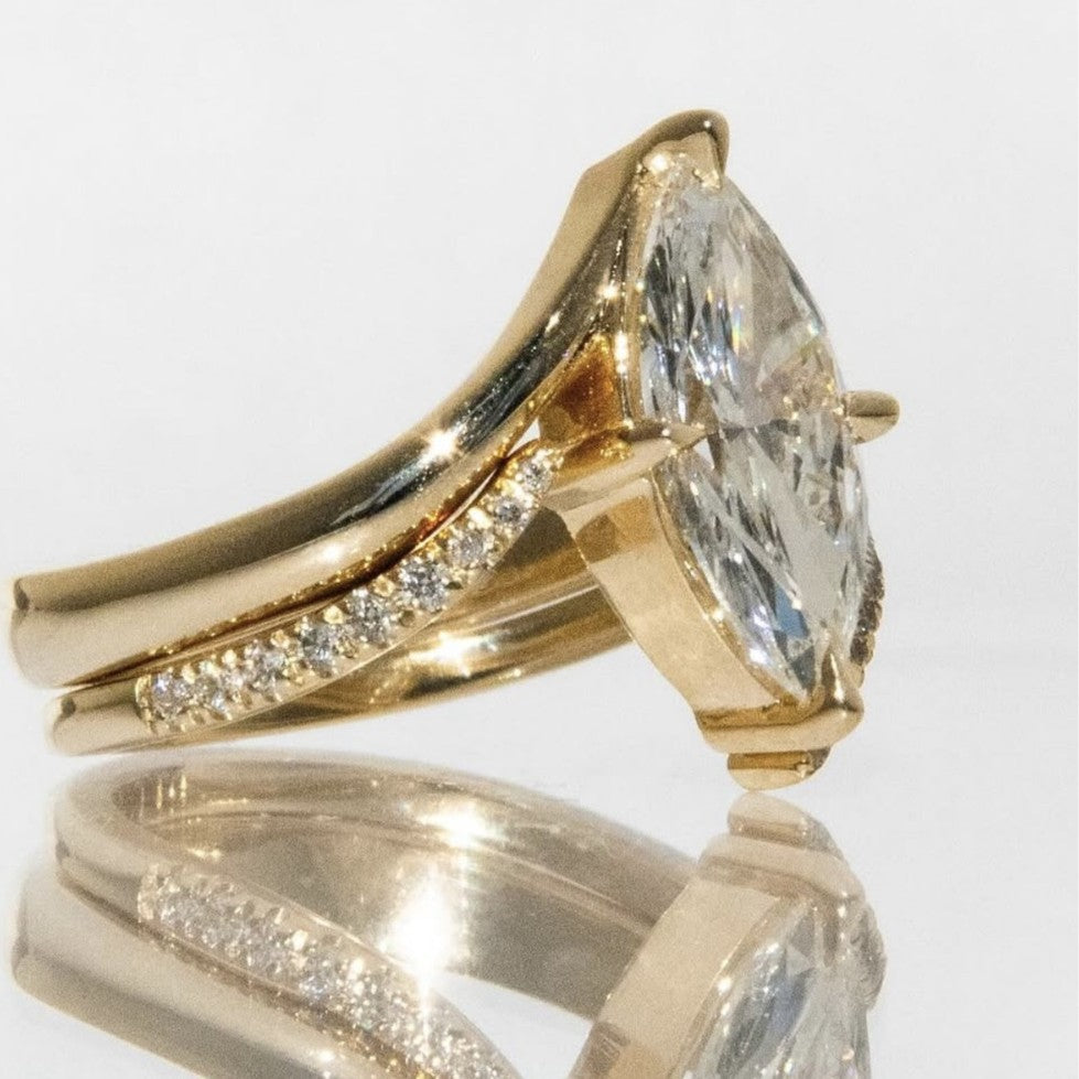 Yellow gold marquise stacking set on neutral background. Alt: “3ct Marquise Diamond Stacking Set – 18K Yellow Gold.”