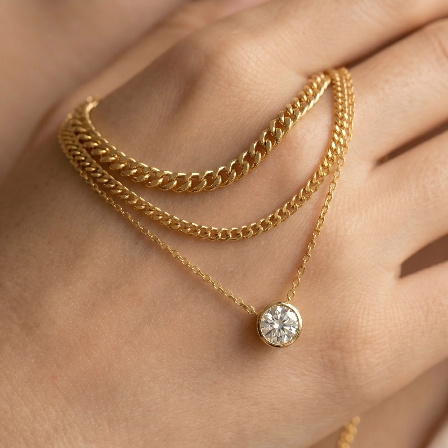 Macro, necklace draped across female hand, natural curve, warm soft light, mirror metal shine, sharp sparkle, blurred skin background, detailed texture, intimate luxury feel.