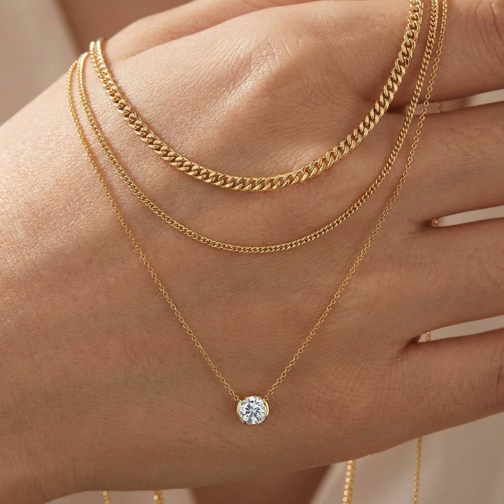 Macro, necklace draped across female hand, natural curve, warm soft light, mirror metal shine, sharp sparkle, blurred skin background, detailed texture, intimate luxury feel.