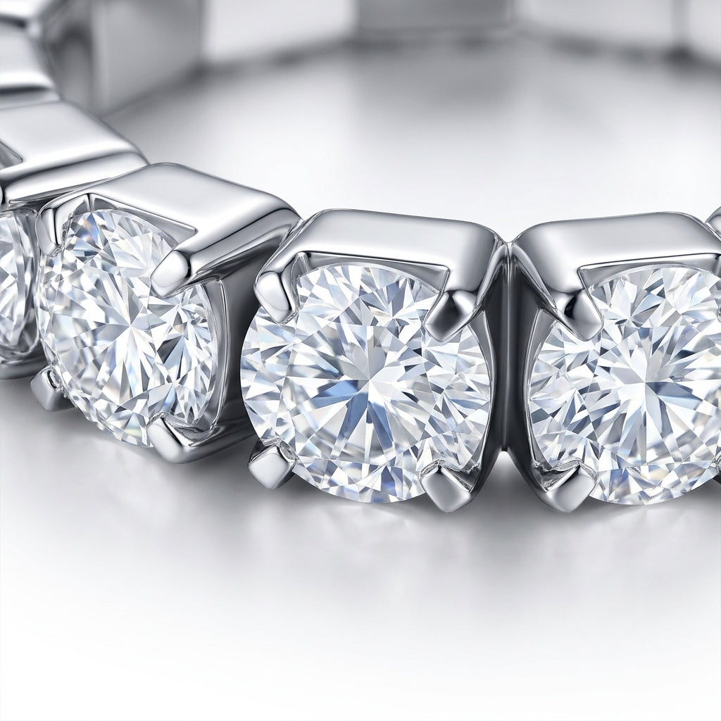 Macro view showing shared prong setting and round moissanite stones on eternity band.