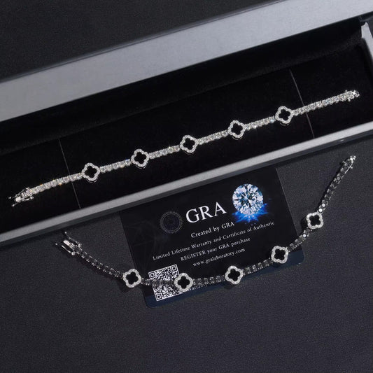 Silver bracelet with GRA branding on a black background