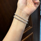 Female model wearing the bracelet on wrist.