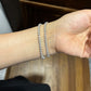 Female model wearing the bracelet on wrist.