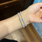Female model wearing the bracelet on wrist.