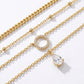 Macro, layered necklaces in 45° diagonal parallel layout, even spacing, mirror-polished gold, bright clean lighting, sharp stone brilliance, white textured background, soft shadow, ultra-detailed.