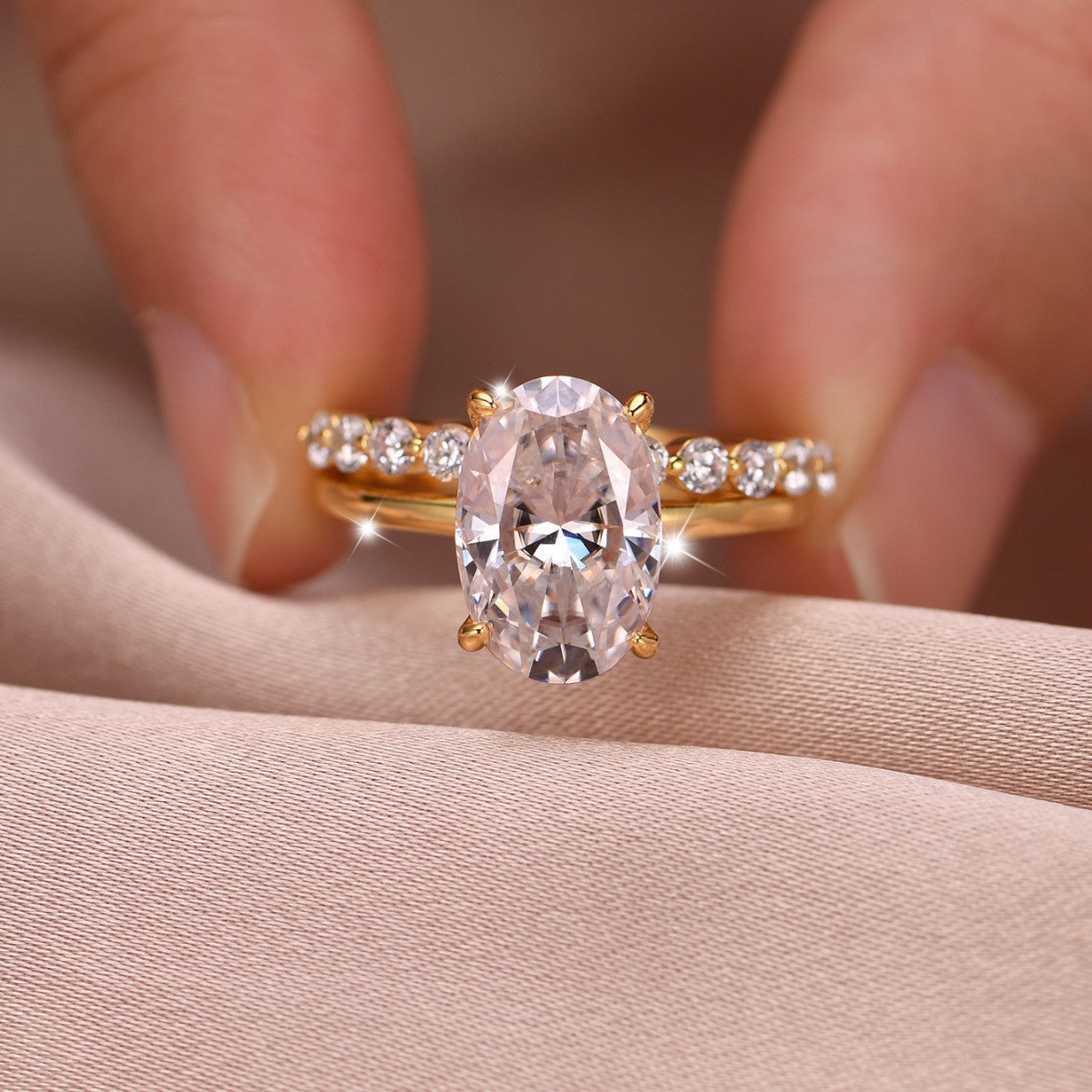 Set worn as double-stacked wedding rings. Alt: “Luxury Statement: Oval Diamond Bridal Set.”