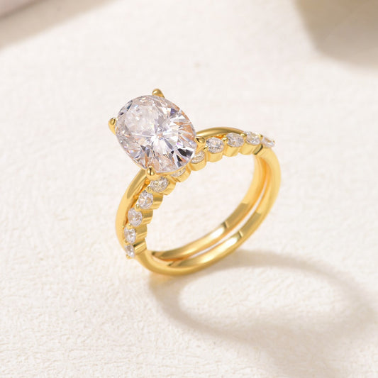 Yellow gold 4.5ct oval stacking set on neutral background. Alt: “4.50ct Oval Diamond Stacking Set – 18K Yellow Gold.”