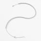 Include a second image showing the necklace gently curved to reveal flexibility and light reflection across multiple flower links.