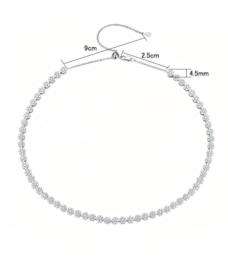 Silver necklace with measurement details on a white background