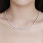 Female model wearing the necklace on bare skin or with an outfit.
