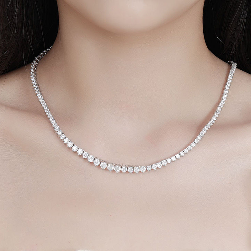 Female model wearing the necklace on bare skin or with an outfit.