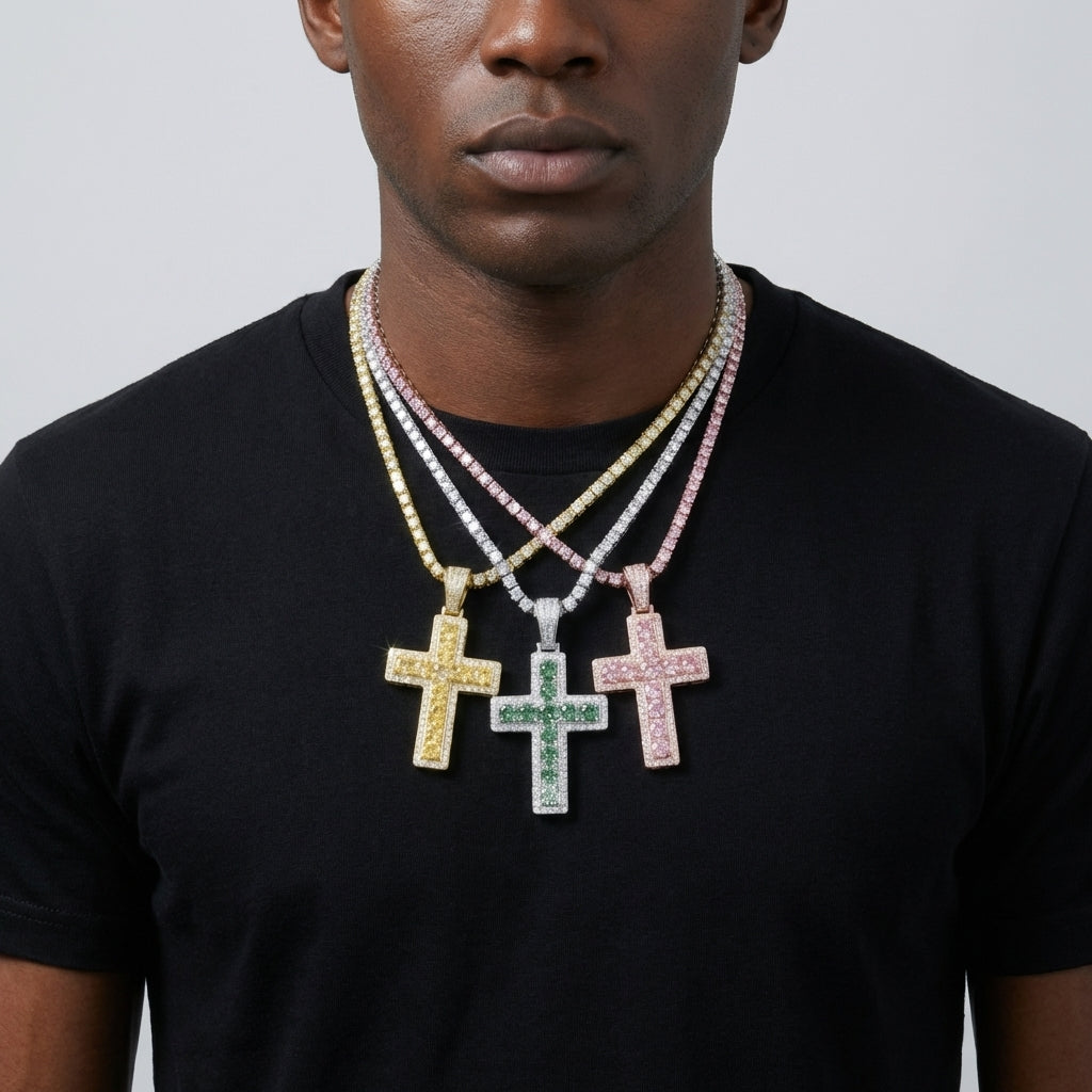 Man in a hoodie and sneakers, the iced out cross resting prominently on the chest — bold, confident, authentic.