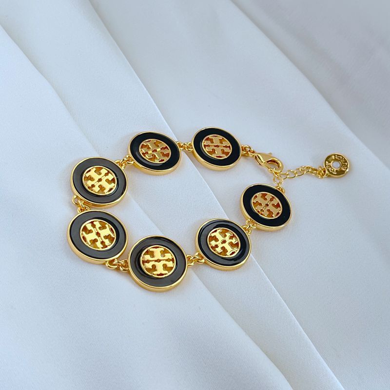 Tory Burch Gold and White Medallion Bracelet